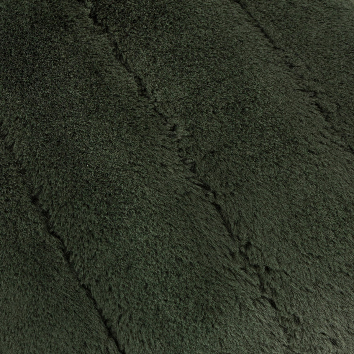 Close-up of the Empress Plain Faux Fur Cushion in pine green, showing brushed high-pile polyester with raked, panelled channels running across the surface.