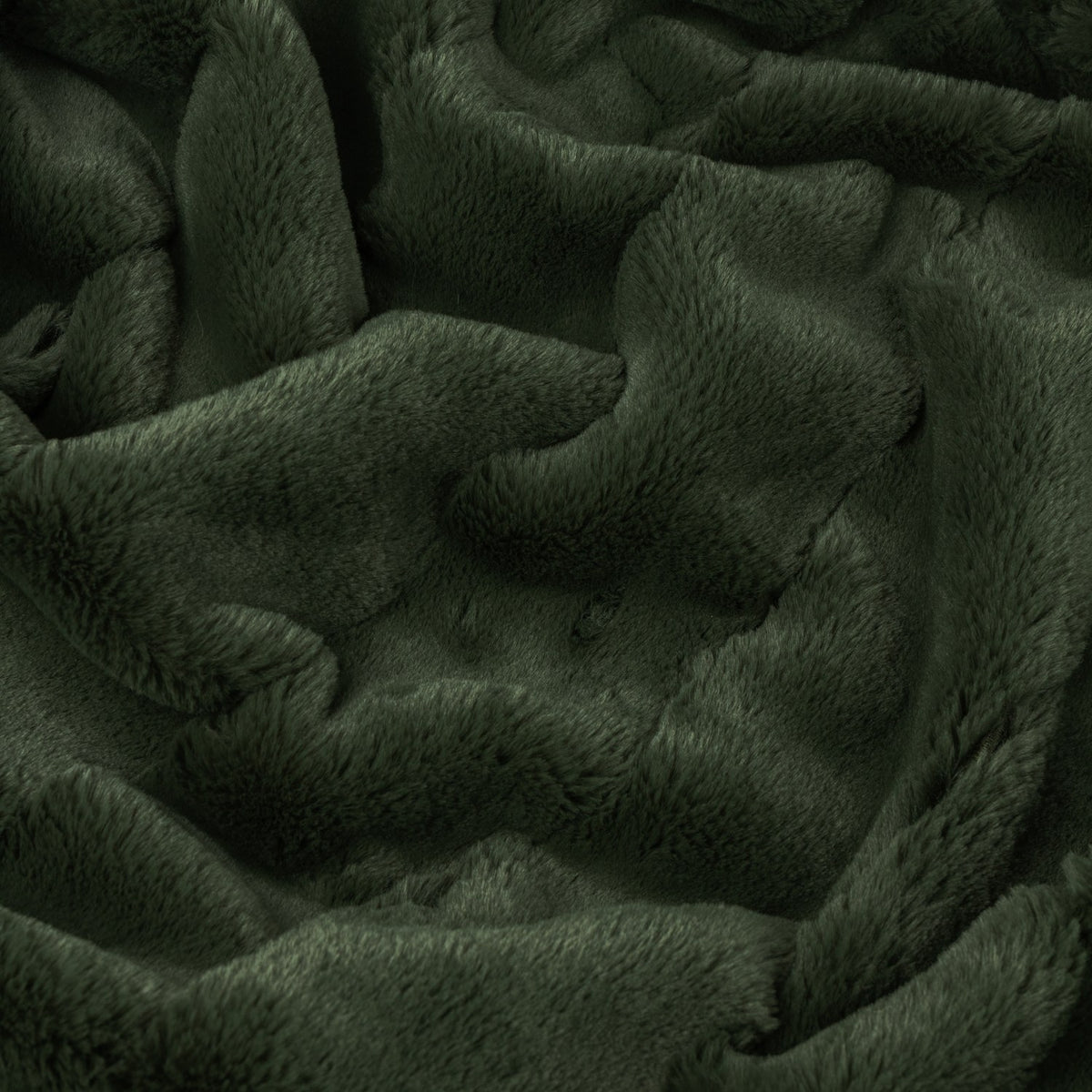 Empress Plain Faux Fur Throw in pine green, close-up of dense plush pile texture draped in folds, 100% polyester.