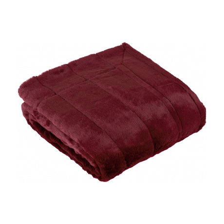 Empress Velvet Faux Fur Throw in ruby red, folded to show its plush, ribbed pile texture, shown on a plain white background.