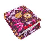 Enchanted Printed Polyester Throw folded to show its plum ground with pink, lilac, gold and red mystical print, sherpa fleece reverse visible, on a plain white background.