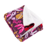 Pink Enchanted Printed Polyester Throw, plum-ground mystical print with doves, stars and a ringed planet, corner turned back to show white sherpa fleece reverse.
