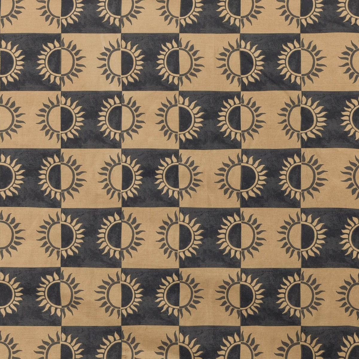 Ethereal Reversible Abstract Duvet Cover Set in Gold Rust, reverse side shown with a checkerboard pattern of tonal sun motifs in gold and dark grey.