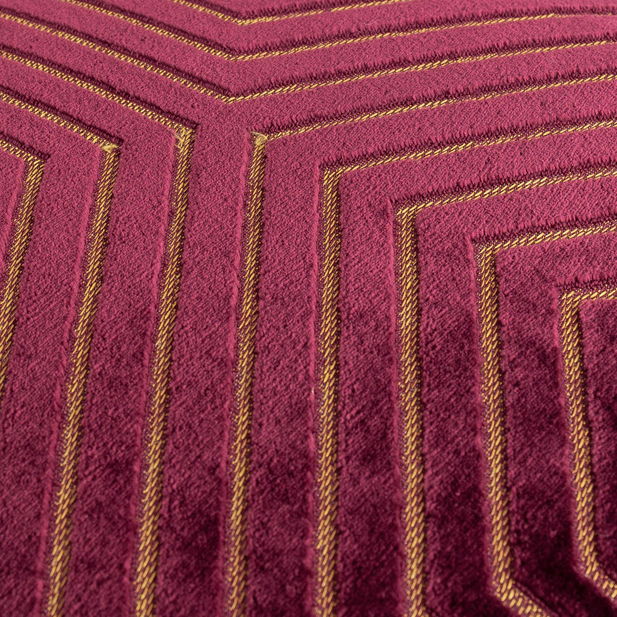 Close-up of the Evoke Geometric Velvet Cushion in burgundy, showing raised chevron channels in deep red velvet lined with fine gold cording.