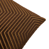 Close-up of the Evoke Geometric Velvet Cushion in chocolate, showing chevron lines in tan and gold on brown velvet with a piped edge, set against a white background.