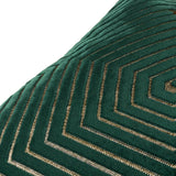 Close-up of the Evoke Geometric Velvet Cushion in emerald, showing chevron-patterned velvet with metallic gold thread detailing on a plain white background.