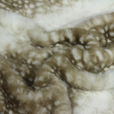 Close-up of the Fawn Animal Faux Fur Throw, showing dappled fawn-print markings in soft browns and cream across a supersoft polyester pile.