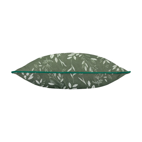 Fearne velvet square cushion in sage green with white botanical fern and leaf print, shown side-on with green piping edge on a white background.