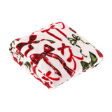 Nathaliefestivebows Bows Polyester Throw folded on a white background, cream fleece with a printed bow design in berry red, pine green, and red tartan check.