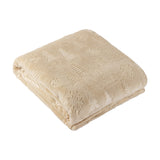 Folded natural beige polyester fleece throw with embossed Christmas tree and snowflake motifs, shown on a plain white background.