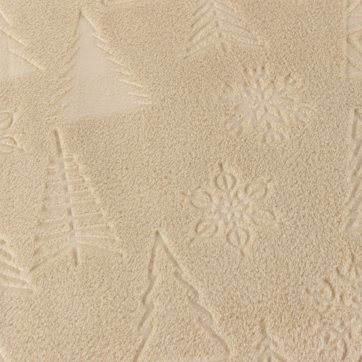 Close-up of the Festive Time Woodland Polyester Throw in natural beige, showing embossed Christmas tree and snowflake motifs textured into the soft fleece pile.