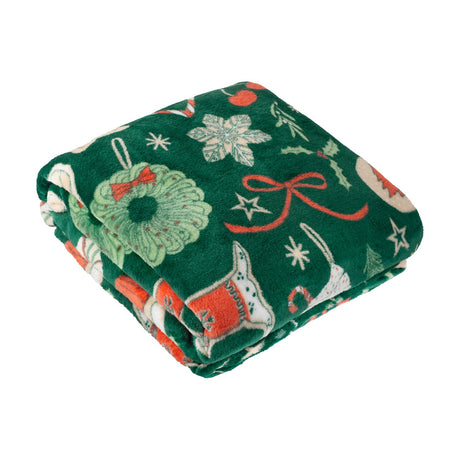 Folded Festive Treats Printed Polyester Throw in emerald green, showing a Christmas fleece print with wreaths, snowflakes, ribbons, and dogs in jumpers on a white background.