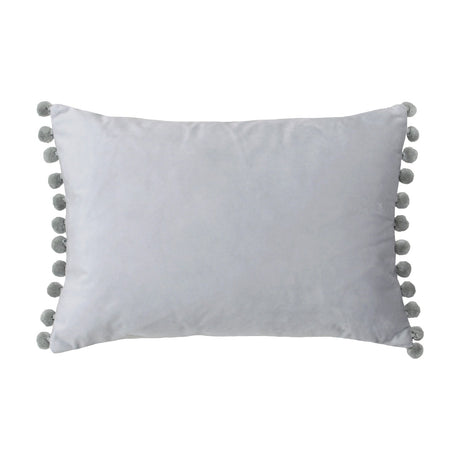 Fiesta Plain Velvet Cushion in dove/silver, a rectangular grey cushion with pompom trim along both short edges, shown on a plain white background.
