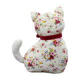 Floral Cat Velvet Cotton Door Stop shaped as a sitting cat with pink, red, blue and yellow floral print, cream ears and tail, and a red velvet neck ribbon, shown against a white background.