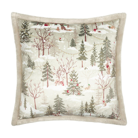 50x50cm Forest Festivities velvet cushion in natural, featuring a printed winter woodland scene of pines, trees and animals with a faux fur border.