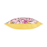 Side view of the Fruits Piped Polyester Cushion in blush pink with lemon, pomegranate and leaf print, plain yellow reverse and yellow piped trim, shown on a white background.