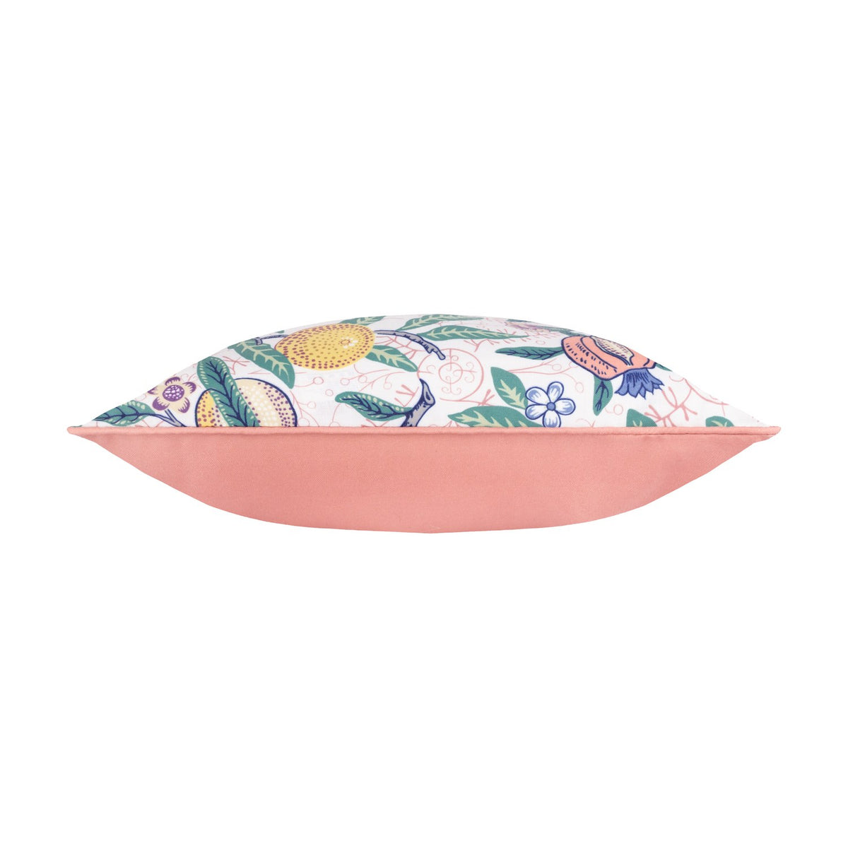 Side view of the Fruits Piped Polyester Cushion in Coral/Lemon, showing a floral fruit print on one face and a solid coral pink reverse with matching piped trim, on a white background.