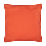 Reverse side of the Fruits Piped Polyester Cushion, shown in plain coral-orange fabric with matching piped edging, on a white background.
