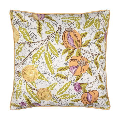 Square polyester cushion with a cream ground printed in a heritage fruit design of pomegranates and citrus among green leafy branches, finished with a yellow piped edge trim.
