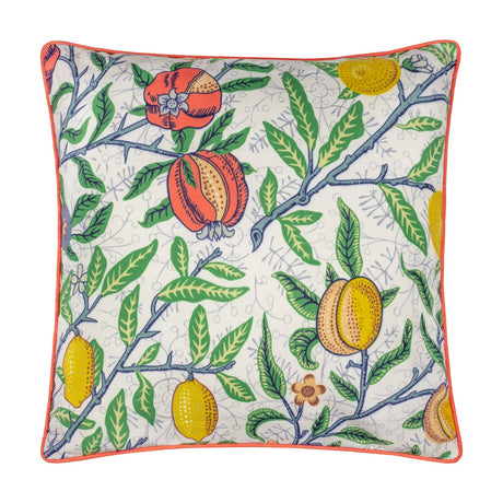 Square polyester cushion with a pale fruit-branch print of coral pomegranates, yellow lemons and apricot-toned fruits among green leaves, edged with orange piping.