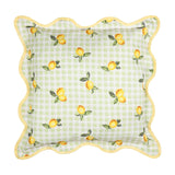 Square outdoor cushion with lemon print on sage green gingham check, scalloped edge and yellow piped trim, shown on a white background.