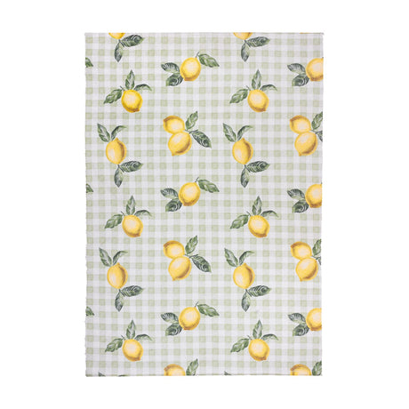 Rectangular polyester rug in sage and cream gingham check, printed with scattered lemon motifs and green leaves, shown on a plain white background.
