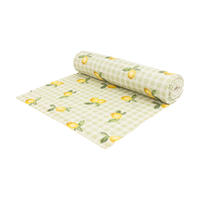 Rolled polyester table runner in sage gingham check with scattered hand-painted lemon and leaf motifs, shown unrolled against a plain white background.
