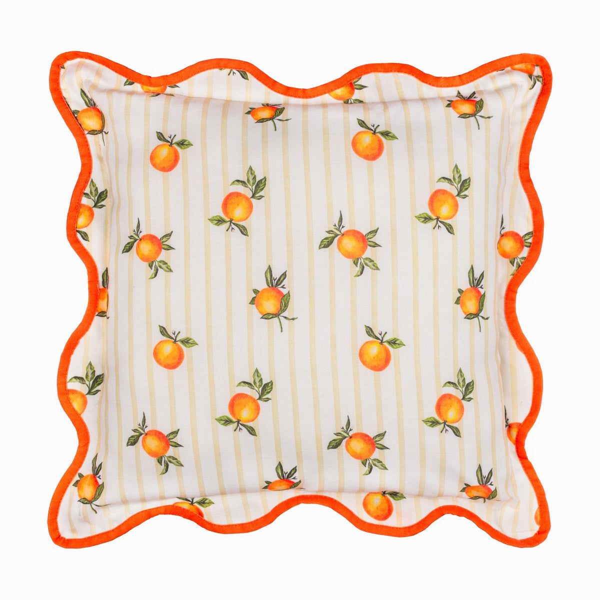 Square polyester cushion with a scattered orange print and green leaves on cream and yellow striped fabric, edged with a wavy orange piped border, shown on a white background.