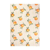Fruits Gingham Polyester Rug in yellow, featuring hand-painted oranges with green leaves over yellow stripes on a cream ground, shown on a plain white background.