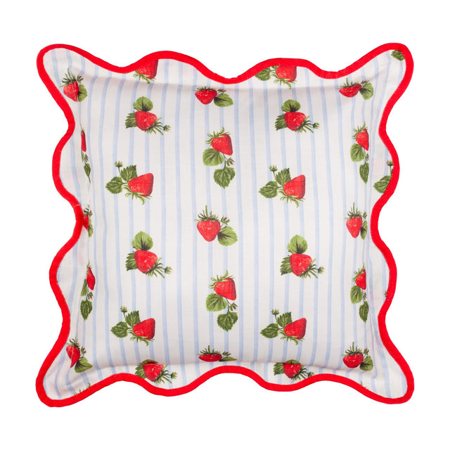 Square scatter cushion in blue striped polyester with a scattered strawberry print and a red scalloped wiggle-edge trim, shown on a plain white background.