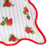 Close-up of the Fruits Striped Polyester Cushion in blue, showing a strawberry print on fine blue-and-white stripes with a red scalloped piped edge.