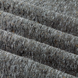 Close-up of Galaxy Chenille Fully Lined Eyelet Curtains in charcoal, showing textured folds with grey-to-black yarn tones and subtle gold flecks catching the light.
