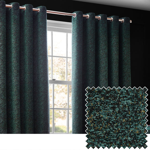 Galaxy Chenille Fully Lined Eyelet Curtains in Emerald, textured green fabric with fine golden flecks, shown hanging from a rod beside a window in a dark-walled room, with a fabric swatch inset.