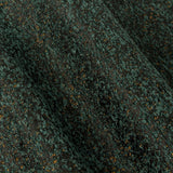Close-up of Galaxy Chenille Fully Lined Eyelet Curtains in emerald, showing draped folds with fine golden flecks across the dense chenille pile.