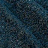 Close-up of Galaxy Chenille Fully Lined Eyelet Curtains in navy, showing folded chenille fabric with a mottled texture and fine gold metallic flecks.