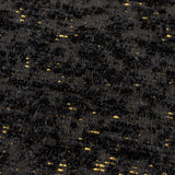 Close-up of the Galaxy Eyelet Chenille Cushion in black, showing textured chenille pile with fine gold flecks woven through the tufting.