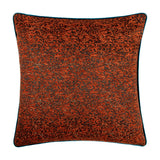 Square Galaxy Eyelet Chenille Cushion in copper, featuring a mottled dark and rust-orange chenille face with a teal piped edge, shown on a plain white background.