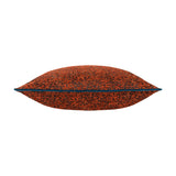 Side view of the Galaxy Eyelet Chenille Cushion in Copper, showing a textured dark and rust-orange chenille fabric with a teal piped edge, on a plain white background.