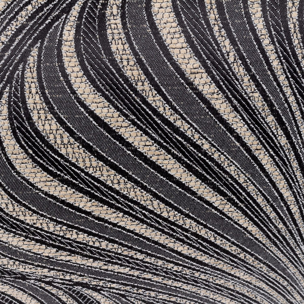 Gatsby Eyelet Polyester Cushion in black, close-up of woven Art Nouveau swirl pattern in natural tone on a black fabric ground.