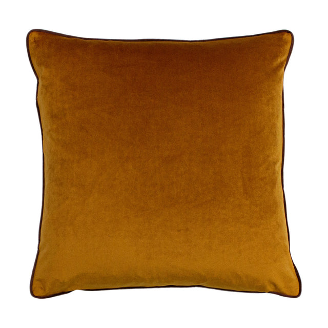 Gemini Reversible Velvet Cushion in pumpkin orange with contrasting dark piping trim along the edges, shown against a plain white background.