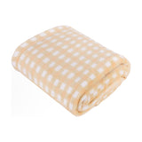 Folded polyester fleece throw in a pale yellow and white gingham check pattern, shown against a plain white background.