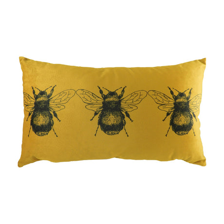Rectangular gold velvet lumbar cushion with three black line-drawn bees printed across the front, shown on a plain white background.