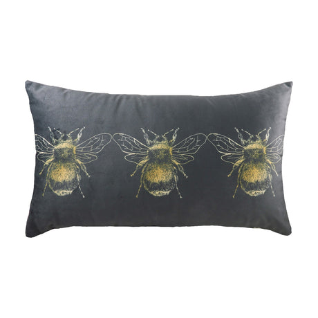 Rectangular grey velvet-effect cushion with three gold printed bee motifs in a row across the front, plain grey reverse, shown on a white background.