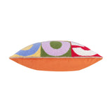Side view of the Good Times tufted polyester cushion, showing an orange fabric back and boucle-textured front in blue, yellow, lilac, green, red and white blocks, on a white background.