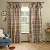 Harriet Gingham cotton pencil pleat curtains in buttermilk and chocolate check with ruffled header, shown floor-length either side of a window in a living room setting.