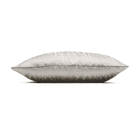 Side view of the Hamlet Printed Polyester Cushion in alabaster, showing a rectangular shape with a shimmering marbled metallic print on cream fabric, set against a plain white background.
