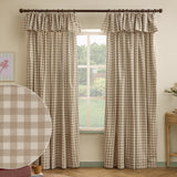 Harriet Gingham Cotton Pencil Pleat Curtains in natural beige and cream checked print, with ruffled flop-top valance headers, shown hanging in a living room window.