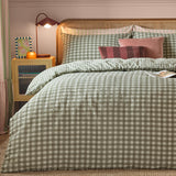 Harriet Gingham Cotton Check Duvet Cover Set in Baygreen/Mist with matching pillowcases on a bed, styled with pink cushions in a bedroom setting.