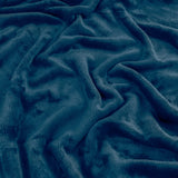 Close-up of the Harrow Plain Polyester Throw in midnight blue, showing the soft flannel fleece surface with folds revealing subtle tonal depth.