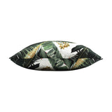 Hawaii Jungle Polyester Cushion in Multi, shown side-on to display its plump shape, with a green tropical leaf print and amber-gold flowers on a pale ground, against a plain white background.