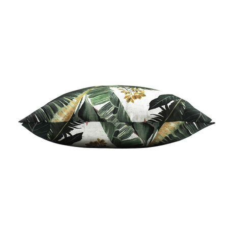 Hawaii Jungle Polyester Cushion in Multi, shown side-on to display its plump shape, with a green tropical leaf print and amber-gold flowers on a pale ground, against a plain white background.